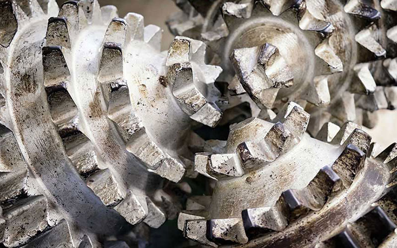 Cleaner oilfield drill bit manufacturing facilities, fluids and equipment